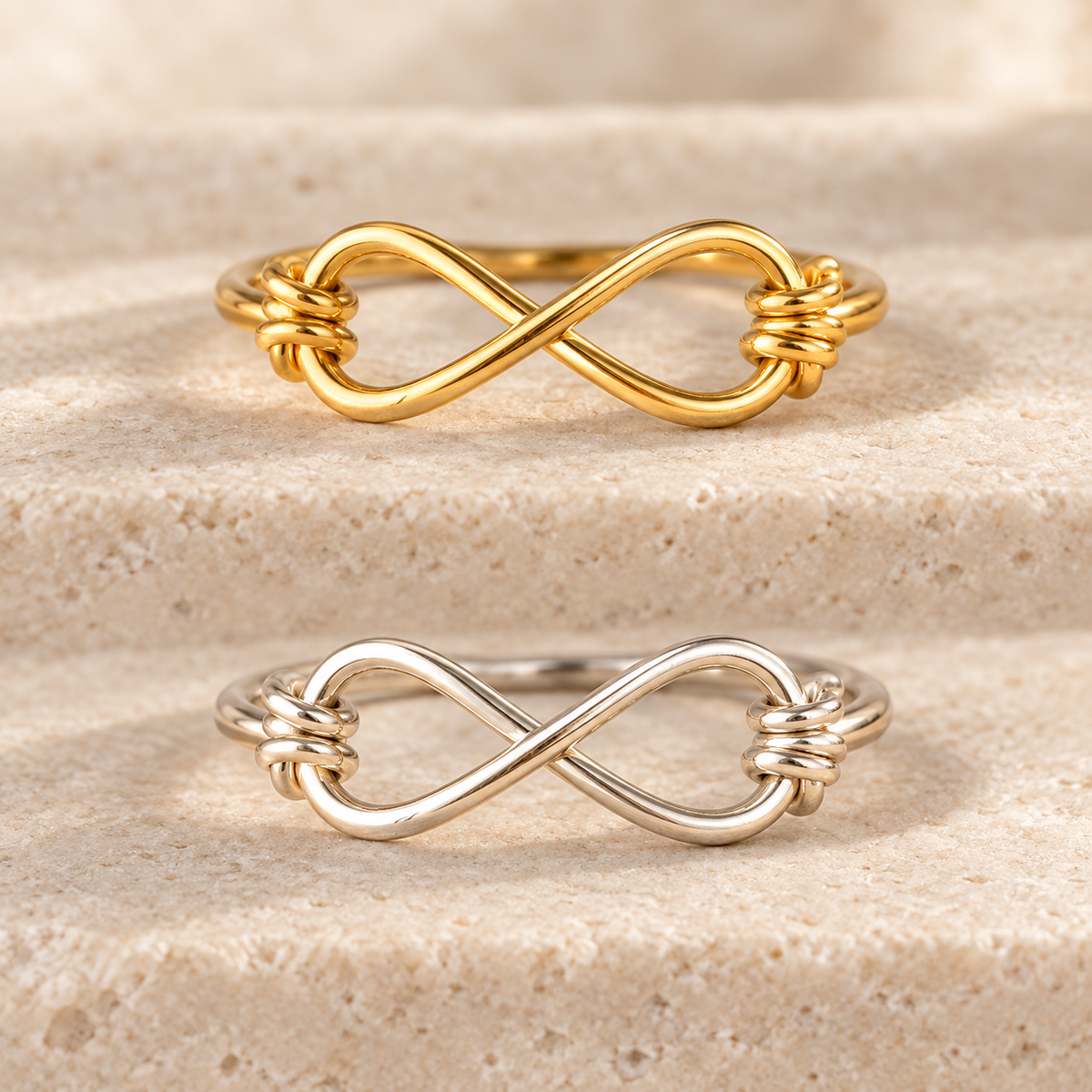 Infinity wire ring in gold-filled and sterling silver, shown together to compare material options; sold individually.