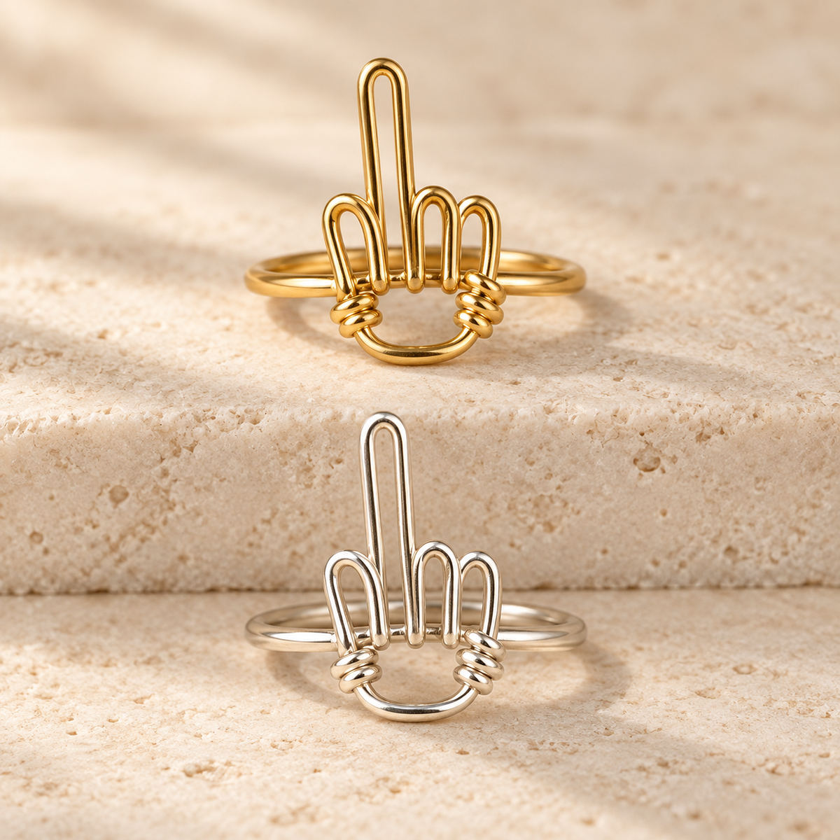 Middle Finger Wire Ring in gold-filled and sterling silver, shown together to compare material options; sold individually.